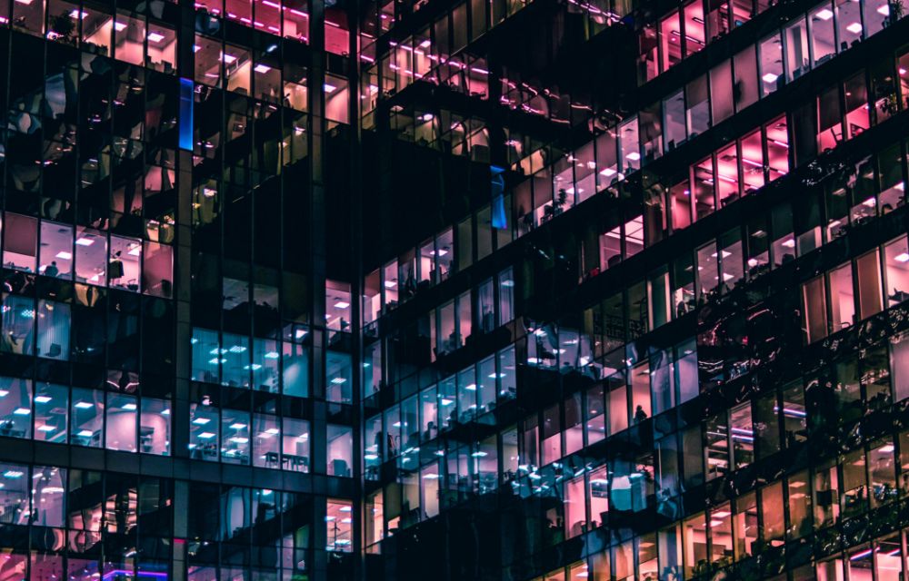 glass office of a consultancy company with pink lighting